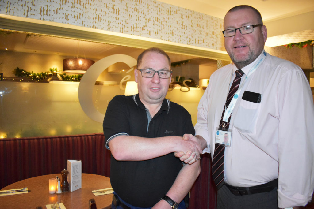 Fair Start Scotland helped James find a job he loves. James is pictured with his work coach Jim